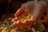 Gold, some gold coins in hand Showing a close-up of the golden light