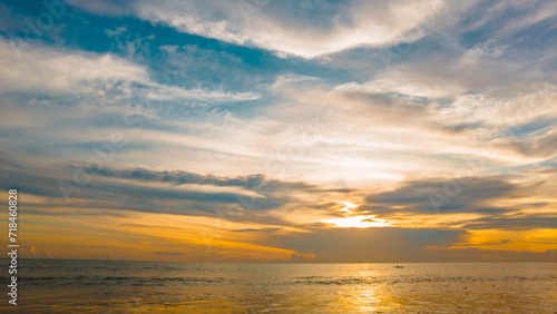 Evening sky over ocean. Golden hour sunset over the sea