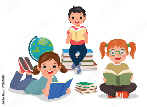 Group of little kids students reading books together