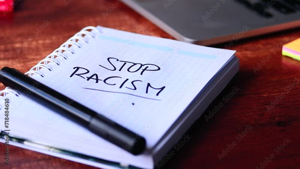 Video of a notebook with an anti-racism message. Video of a notebook with an anti-racism message.