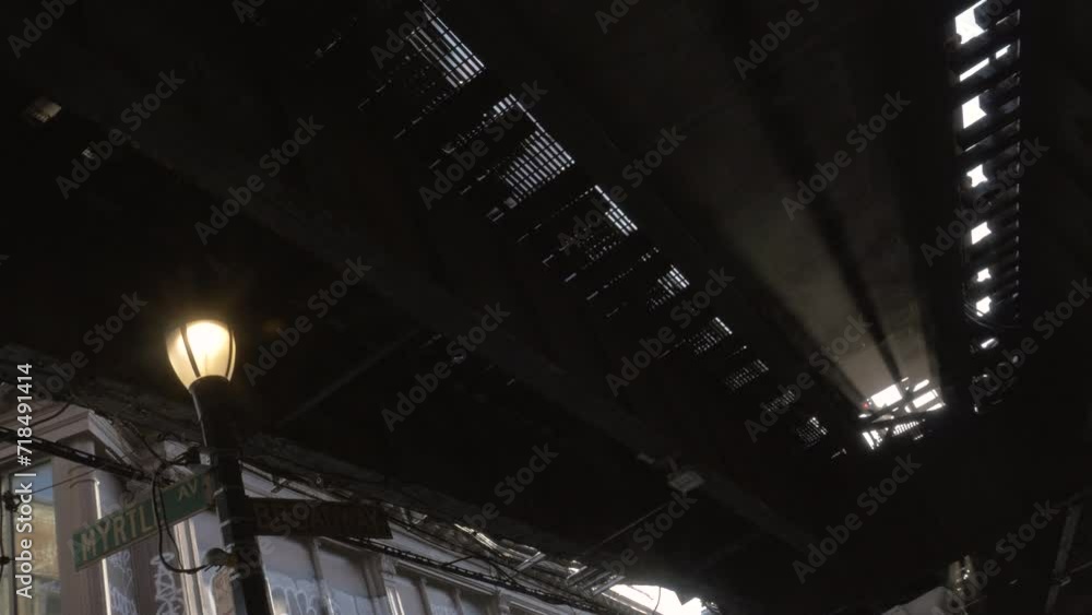 Lookinh up at a subay train passing overhead Lookinh up at a subay train passing overhead