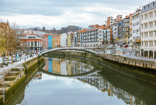 Bilbao, Spain - January 2, 2024: Architectural details of buildings along the Nervion River in Bilbao, Spain 