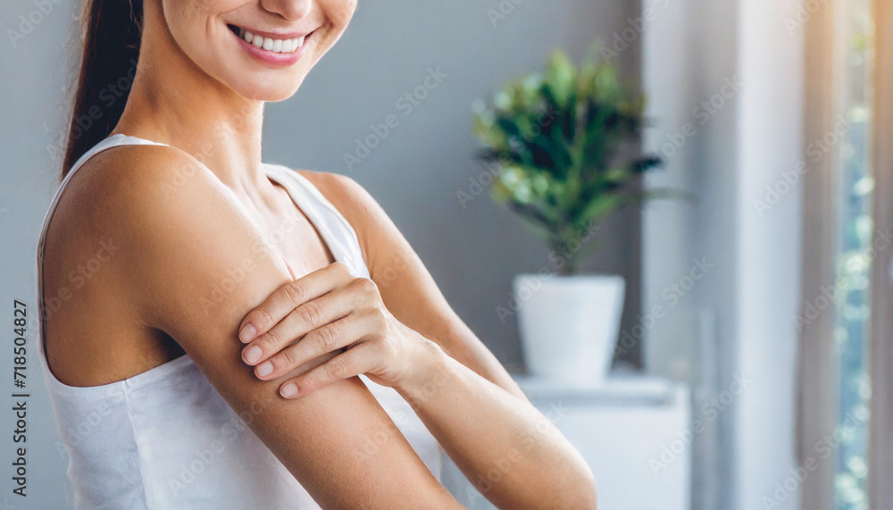 Caucasian woman's arm, emphasizing clean and healthy skin during a beauty care routine indoors Caucasian woman's arm, emphasizing clean and healthy skin during a beauty care routine indoors