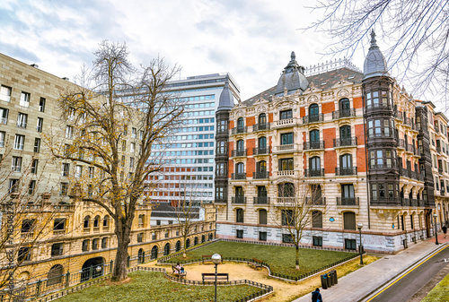 Bilbao, Spain - January 2, 2024: Torres Isozaki apartment buildings, designed by Arata Isozaki along the Nervion River in Bilbao, Spain 