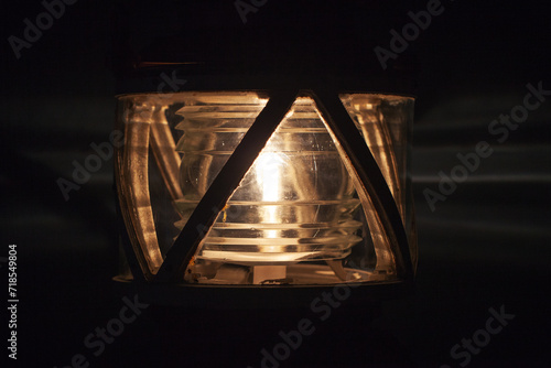 Vintage Lighthouse lamp in metal frame © evannovostro