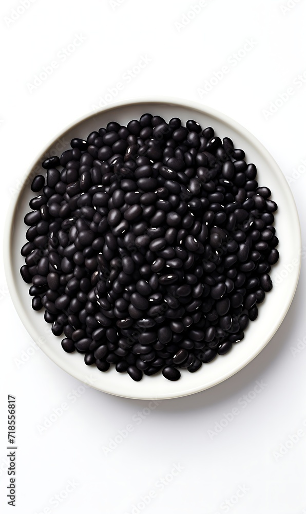 Black beans on plate on white background. Fresh Black beans. Black beans on plate on white background. Fresh Black beans.