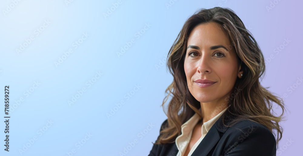 Middle-aged Latina businesswoman in the office. Blurred background. Banner Middle-aged Latina businesswoman in the office. Blurred background. Banner