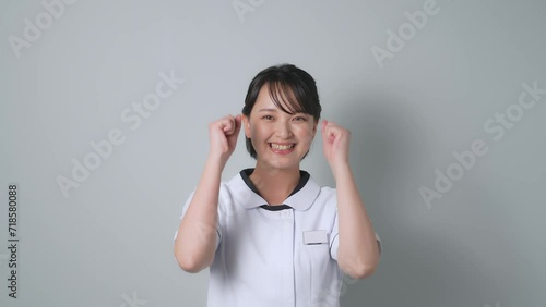 Wallpaper Mural ガッツポーズする白衣を着た女性 Torontodigital.ca