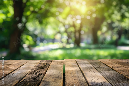 Wooden table top blurred nature garden park background,