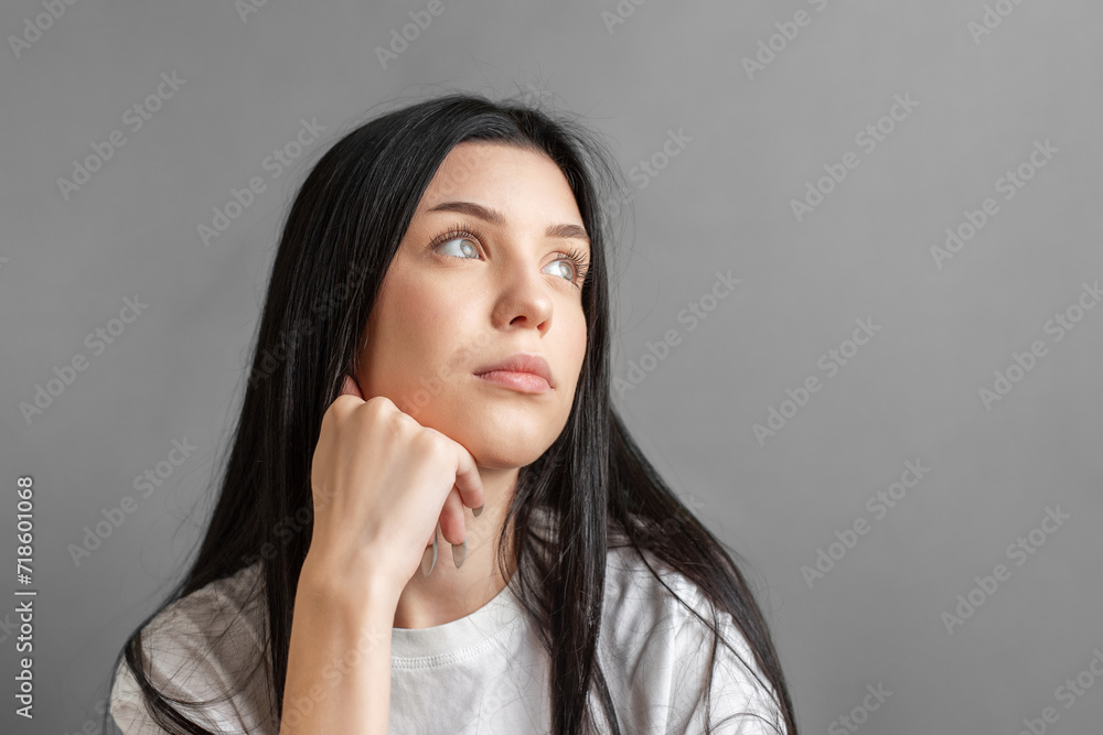 Portrait of a thoughtful young girl. Portrait of a thoughtful young girl.