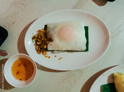 Steamed rice-skin dumplings, Thai style dessert ,Khao Kriab Pak Mor, Thai food made from rice and pork in Thailand. photo