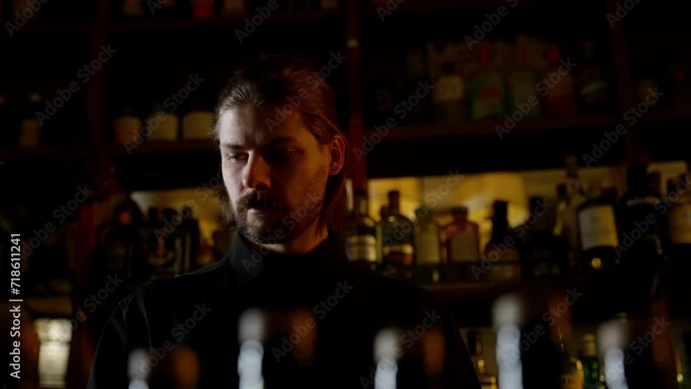 Bartender's Steady Gaze in Atmospheric Bar Bartender's Steady Gaze in Atmospheric Bar