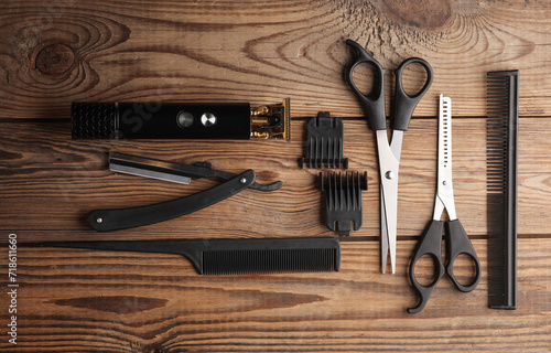 Barber working tools on wooden background. Layout.