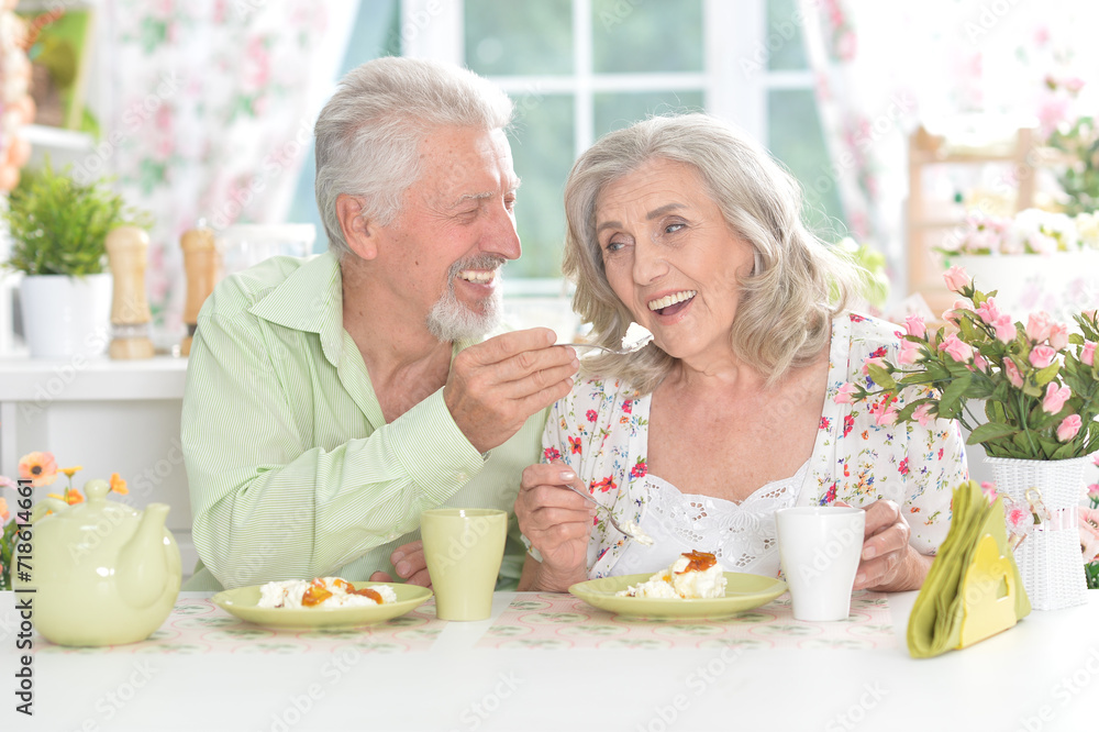 Portrait of senior couple having breakfast at home Portrait of senior couple having breakfast at home