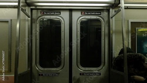 handheld shot of the inside of a subway car photo