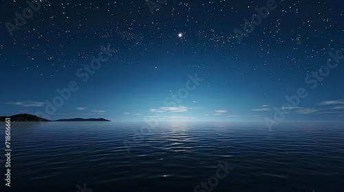 Starry night with a big moon with its reflection on the water-wide shot of the open ocean, beautiful calm blue waters