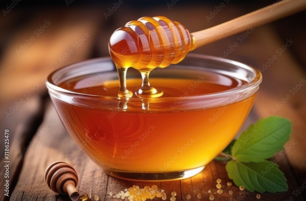 Honey with wooden honey dipper on wooden table. Honey with wooden honey dipper on wooden table.