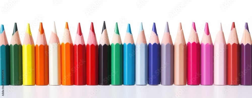 Fototapeta premium Row of colorful pencils on a white background. generative AI