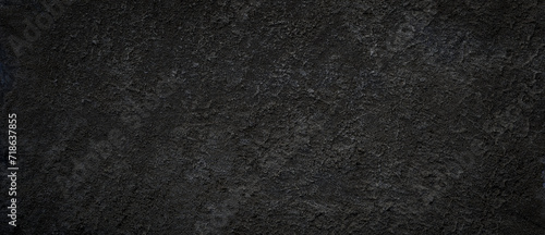 Textured Black Wall or Asphalt Surface Captured Under Even Lighting Conditions