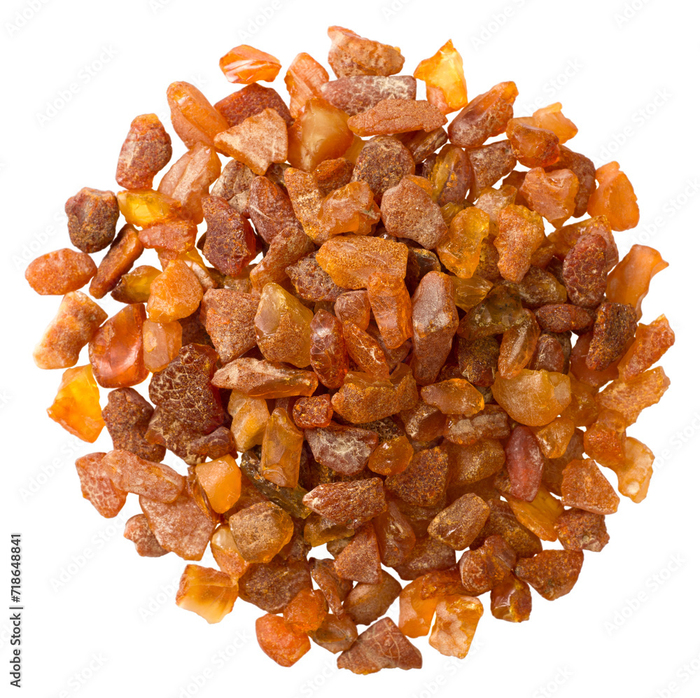 Crushed amber isolated on white background, top view. Crushed amber isolated on white background, top view.