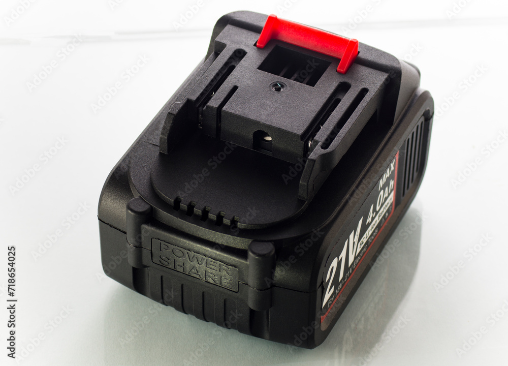 One battery for a hand tool on a white background One battery for a hand tool on a white background