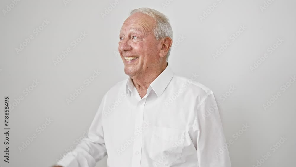 Elder man radiating joy, standing in a shirt, smiling bright, gesturing 'ok' sign, symbol of confidence over an isolated white background Elder man radiating joy, standing in a shirt, smiling bright, gesturing 'ok' sign, symbol of confidence over an isolated white background