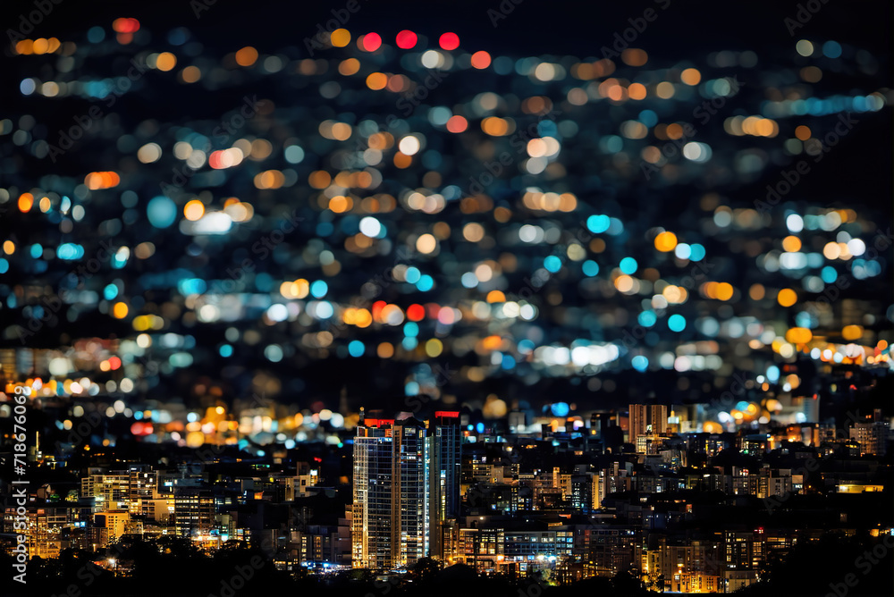 Fototapeta premium Bright night view of bustling city