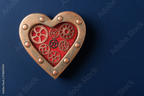 Steampunk Heart Ornament with Gears on Dark Blue Background