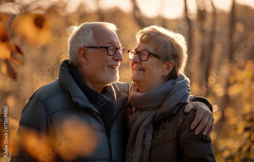 happy senior couple smiles while taking a walk gently around their shoulders in the fall park, friendly eyes, trust and respect. generative AI