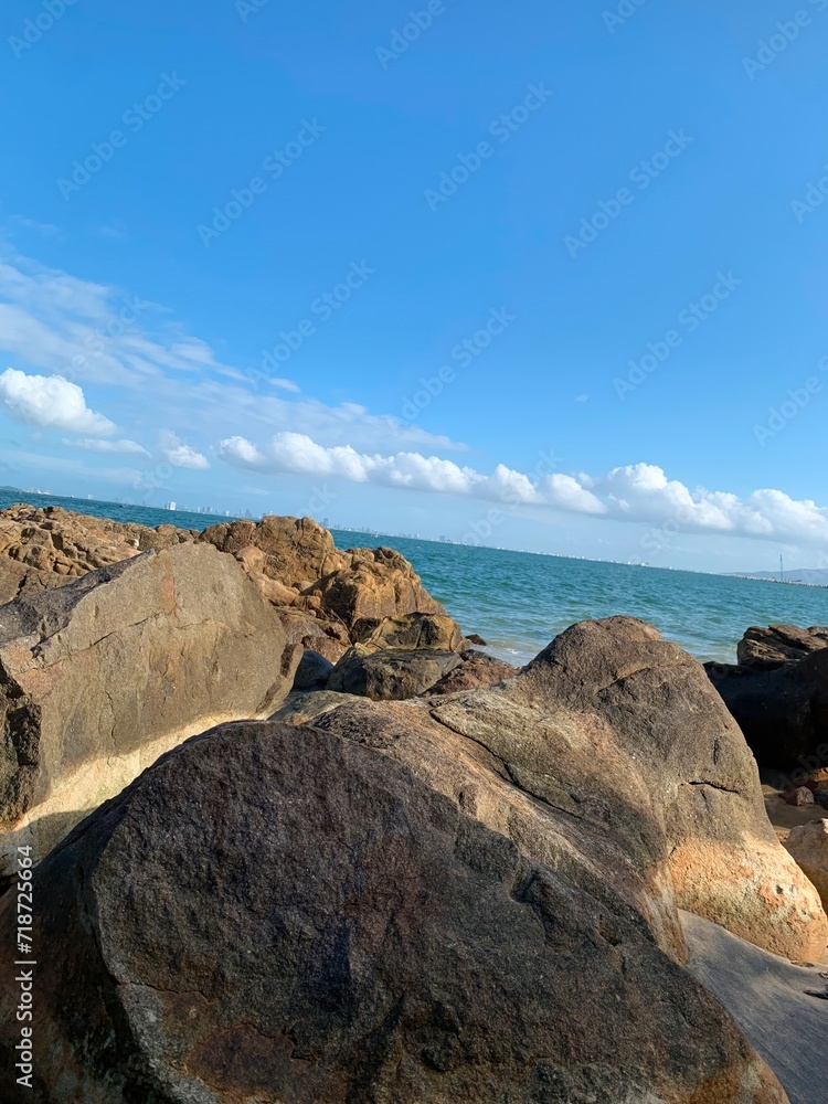 A rock on a sunny day with sea in the background in vietnam