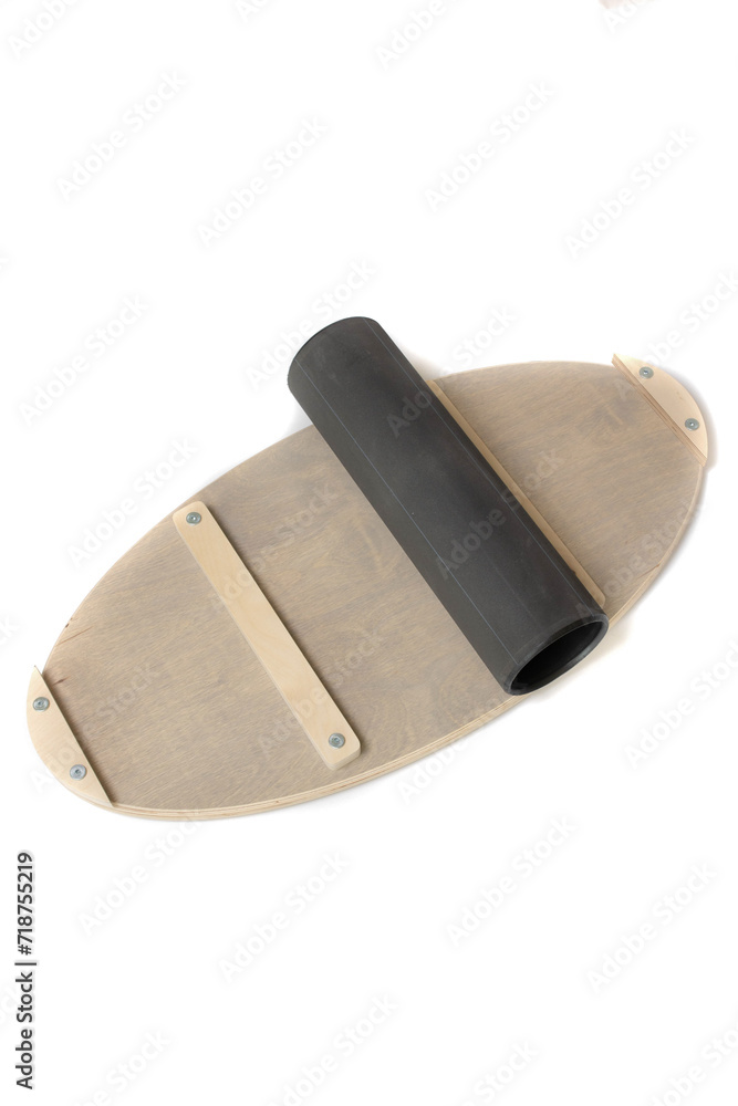 Wooden balance board on white background