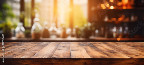 Empty wooden tabletop with bokeh lights on blurred kitchen background