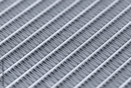 Close-up photo of a car radiator Shows details of the pipe and heat sink.