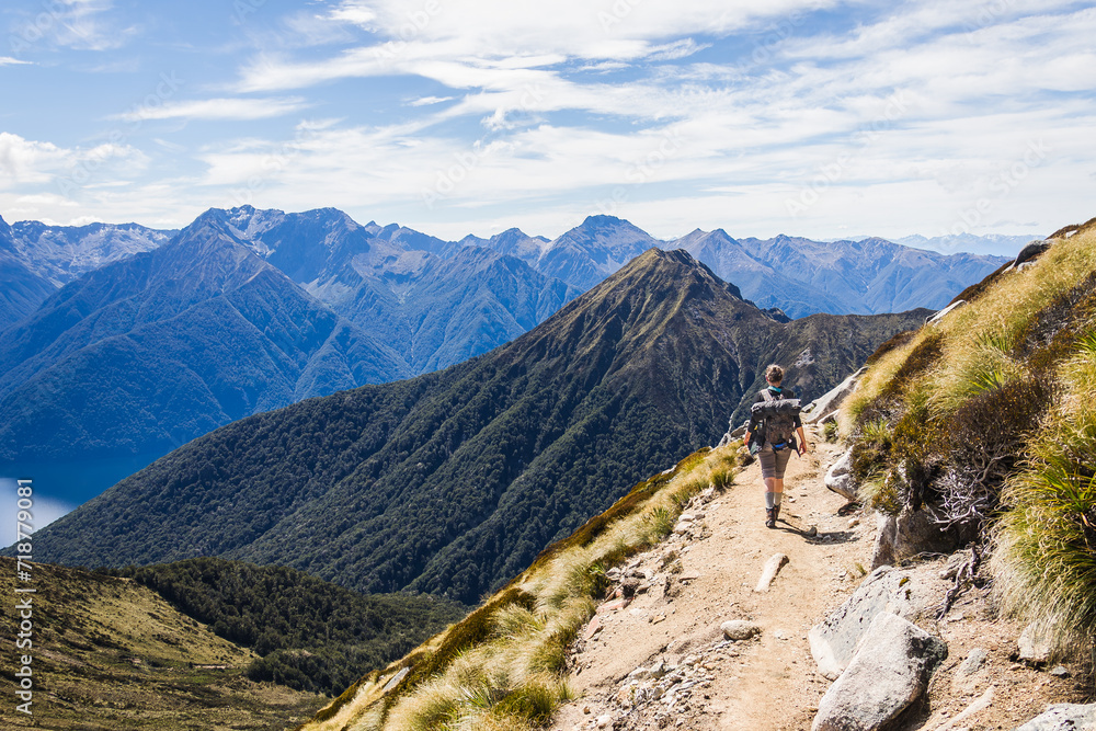 Woman hiking in the New Zealand Alps