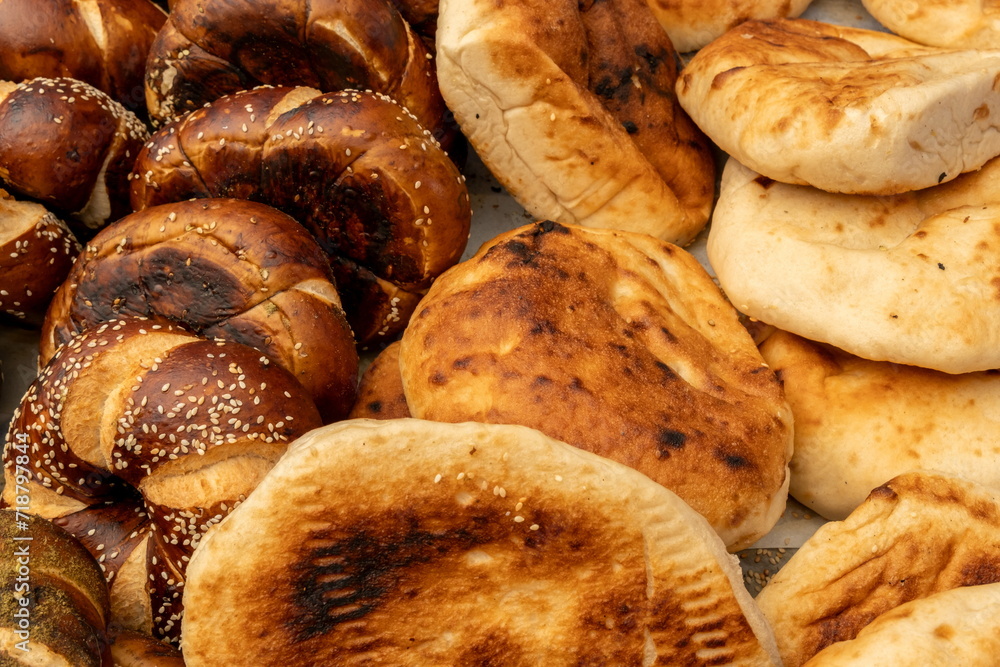 Tradition arabic bread - Pita and small round buns sold at city farmers market