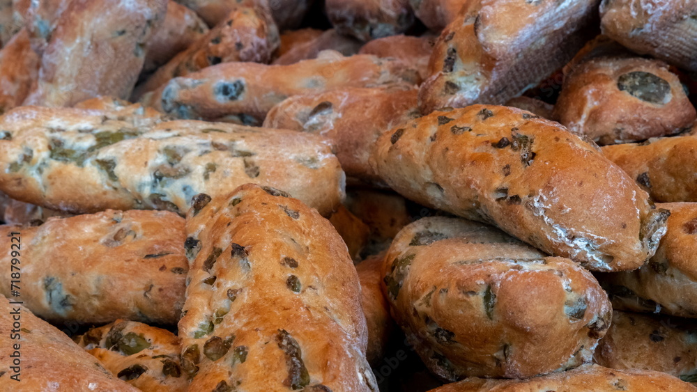 Freshly baked bread with raisins on sale at the Italian fine food market
