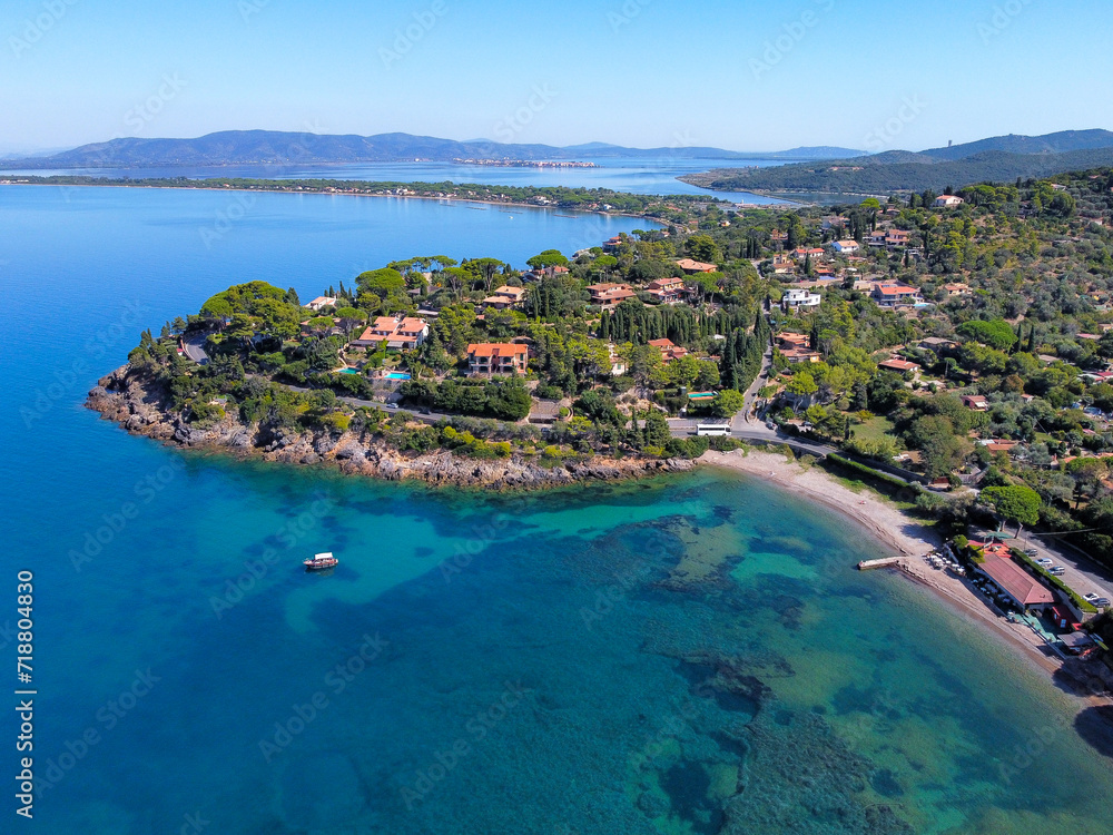 Naklejka premium aerial view of the Argentario coast, in the background the Orbetello lagoon.