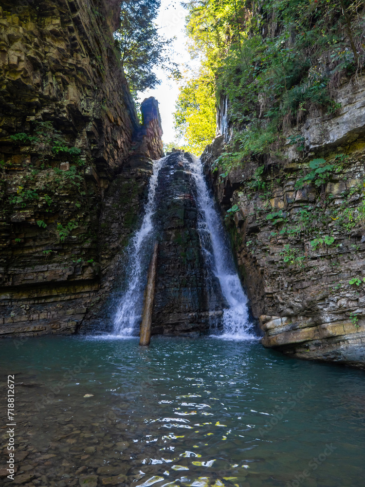 Naklejka premium Cascade of the Bukhtivets waterfall
