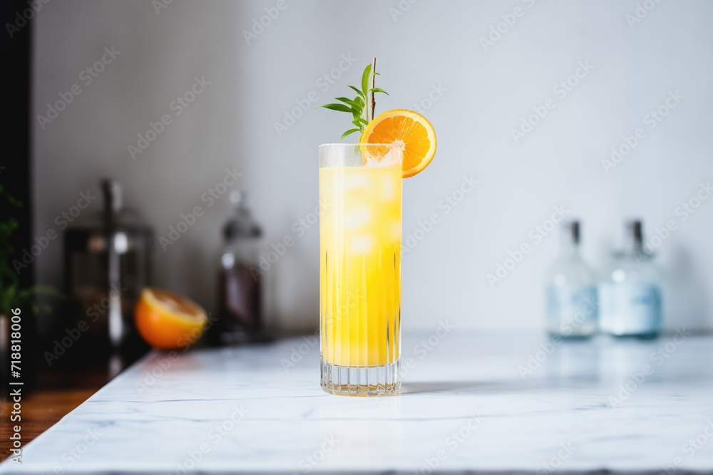 harvey wallbanger in tall glass, orange slice