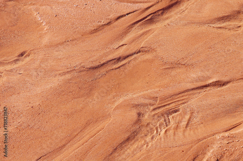 Close-up on orange ground  sand.