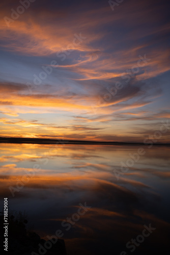 End of the day on a lake, sunset and light in the clouds- Tunisia