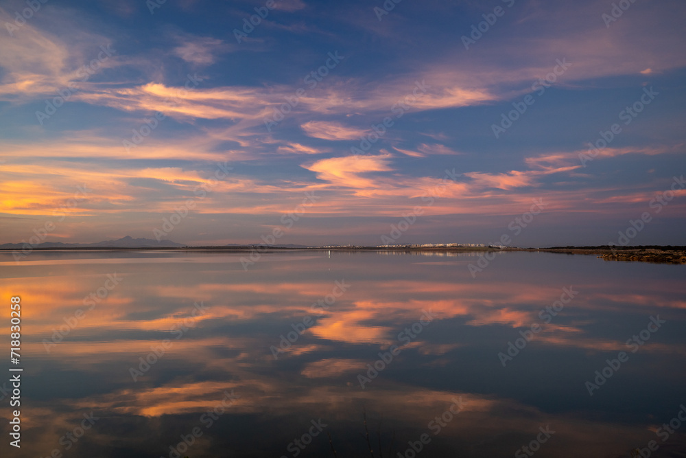 End of the day on a lake, sunset and light in the clouds- Tunisia