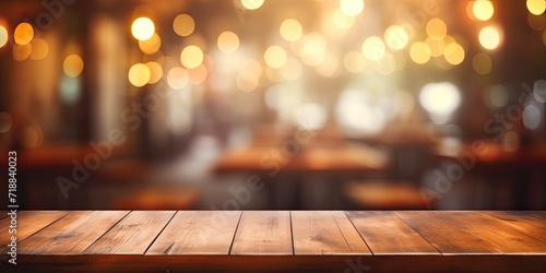 Blurred restaurant backdrop with wooden table.