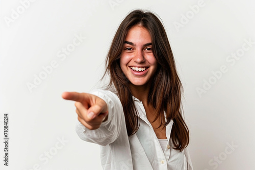 Wallpaper Mural Young woman pointing front with happy expression on white isolated background Torontodigital.ca