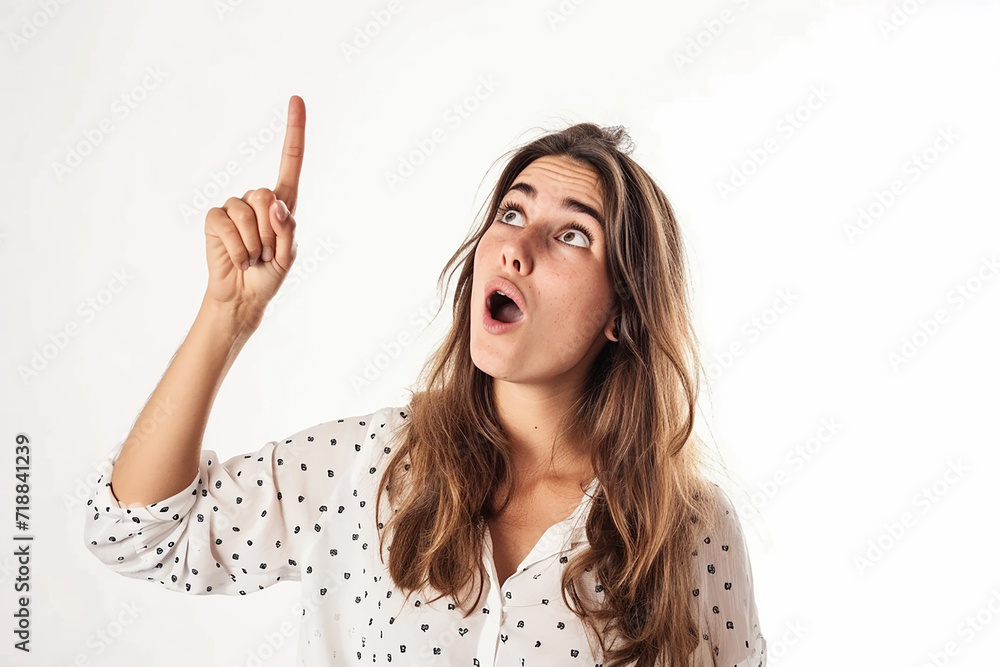 portrait of thinking young woman pointing upwards on isolated white background portrait of thinking young woman pointing upwards on isolated white background