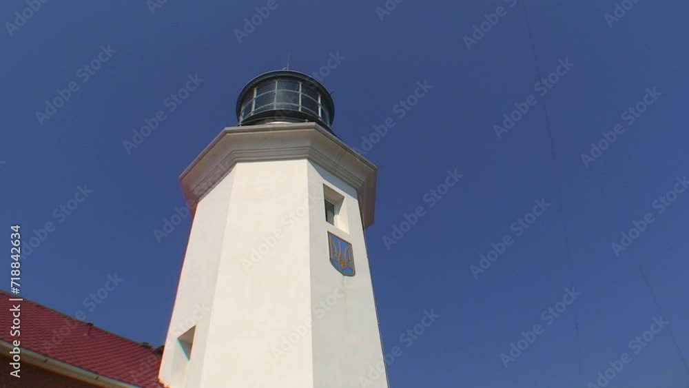 The Snake Island lighthouse tower, bottom and side view. Black Sea, Ukraine. of the Snake Island lighthouse, viewed from below and from the side. Black Sea, Ukraine. The Snake Island lighthouse tower, bottom and side view. Black Sea, Ukraine. of the Snake Island lighthouse, viewed from below and from the side. Black Sea, Ukraine.