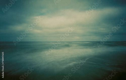 The North Sea photographed with a wooden pinhole camera, captured analogue on film. The small aperture makes for long exposure times in which sand, sea, water, sky and clouds mix with t