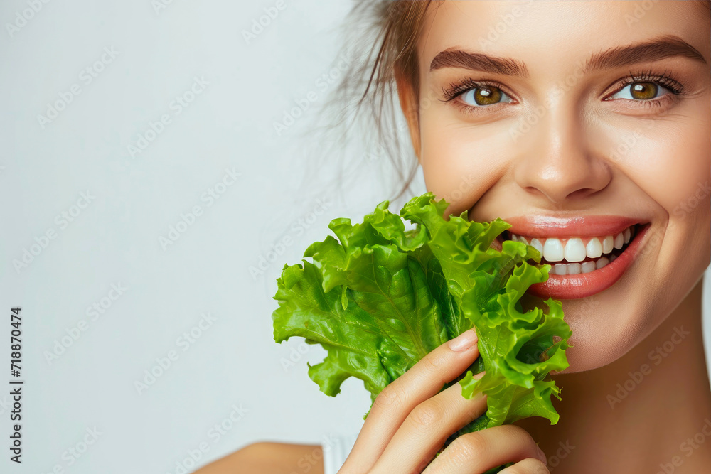 Eating Well: Portrait of Woman with White Teeth and Greens Eating Well: Portrait of Woman with White Teeth and Greens