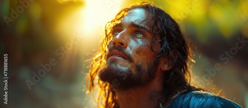 Biblical character. Close-up portrait of a man with a beard and long hair looking up.