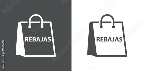 Logo con palabra REBAJAS en español en bolsa de la compra de papel